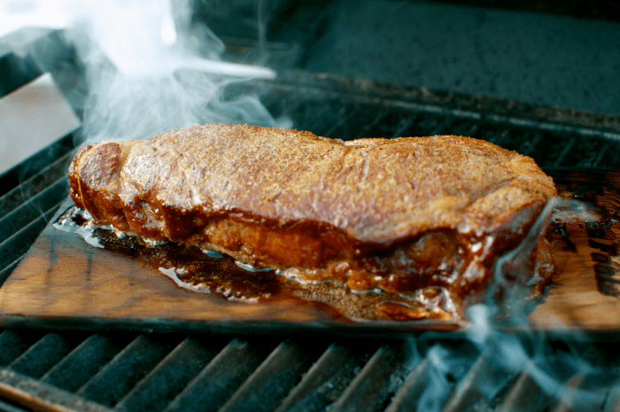 steak on wooden grilling planks